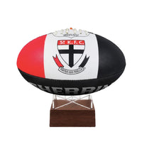 St Kilda AFL football urn red white and black on perspex and timber stand