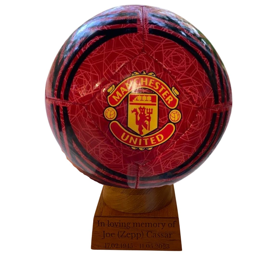 Manchester United Football Urn black and red on timber stand