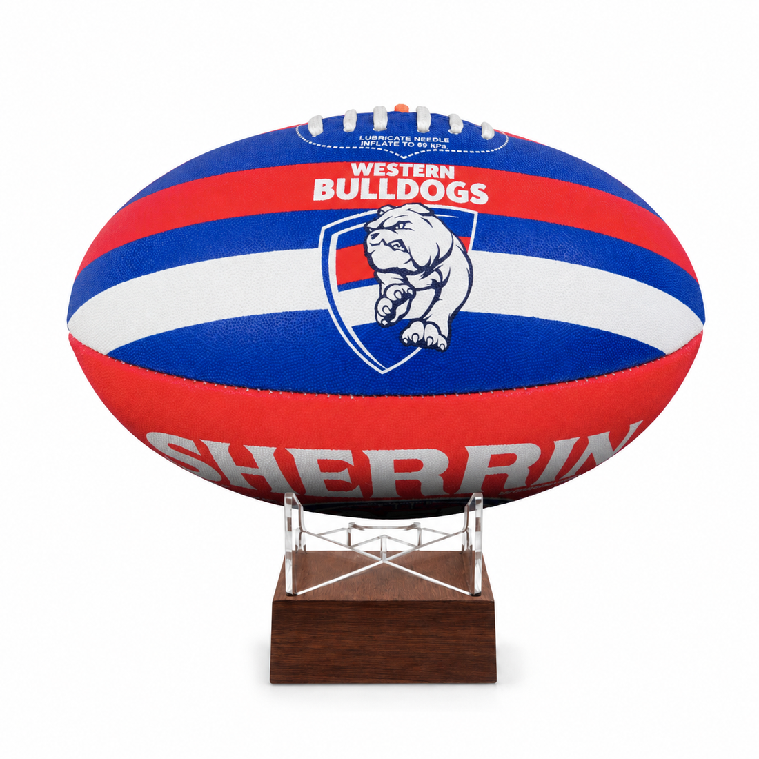 A Western Bulldogs ball displayed on a clear acrylic stand with a dark wood base, set against a plain white background.